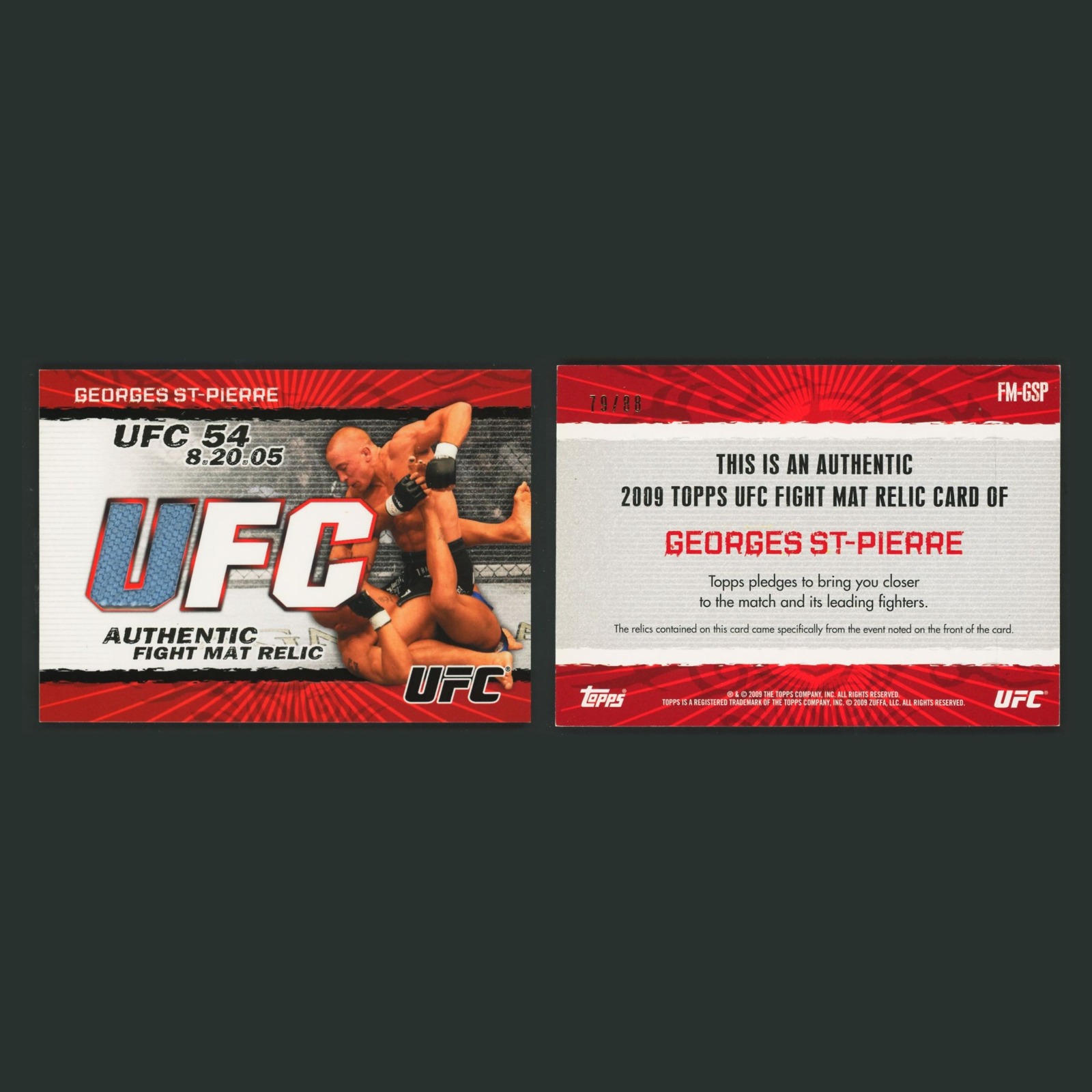 Georges St-Pierre Rookie Patch /88 #FM-GSP 2009 Topps UFC Fight Mat Relic MMA front and back scans. Card condition is Near Mint.