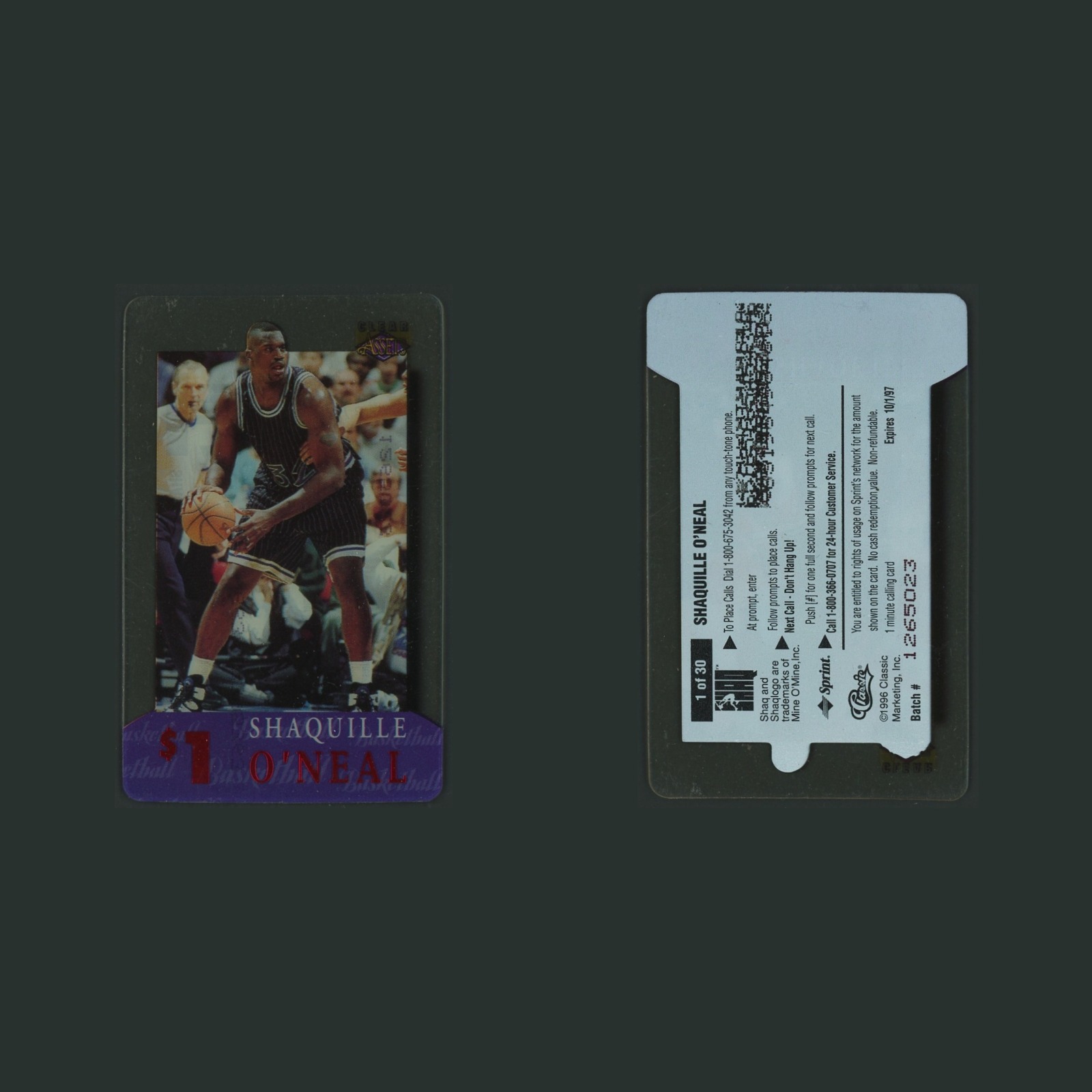 Shaquille O'Neal #1 Shaq 1996-97 Classic Clear Assets Phone Card Orlando Magic front and back scans. Card condition is Near Mint.